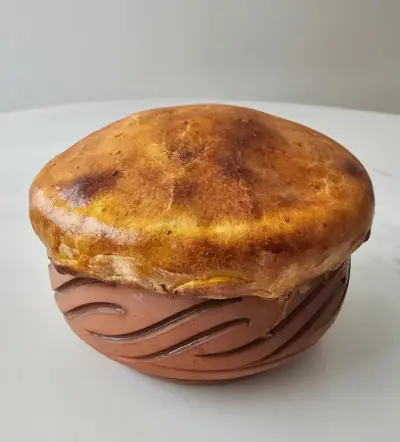 Clay handi sealed with dough, straight from the dum oven